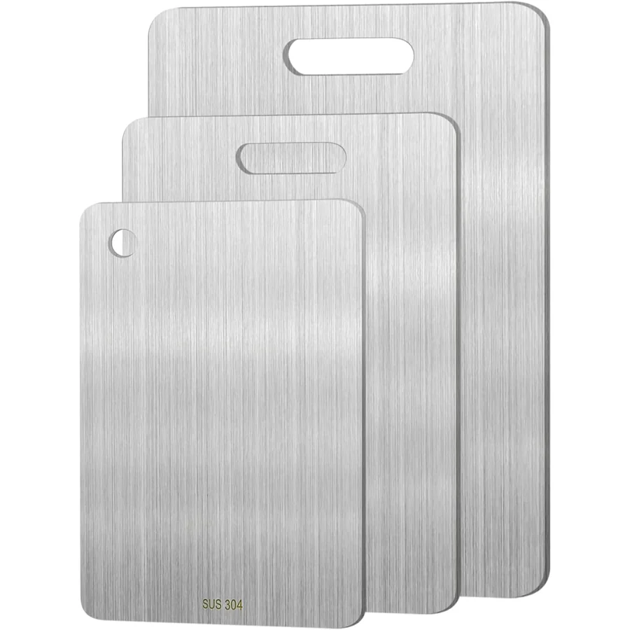 The URMONA three-piece stainless steel cutting board set, small, medium and large, nested.